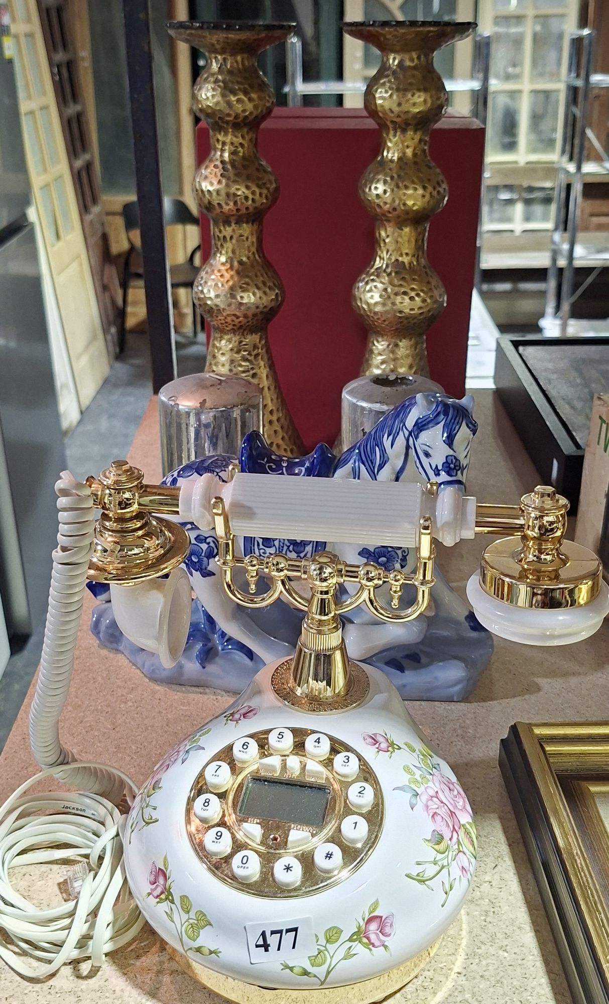 PAIR OF GOLD COLOURED CANDLESTICKS