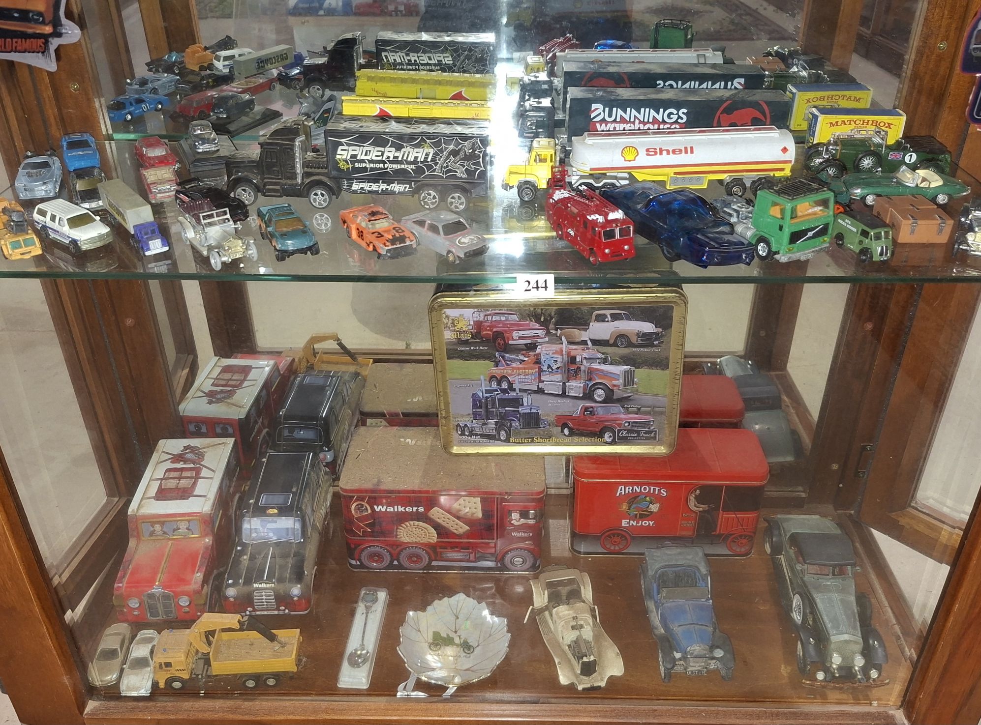 244 · DIE CAST CARS AND TINS