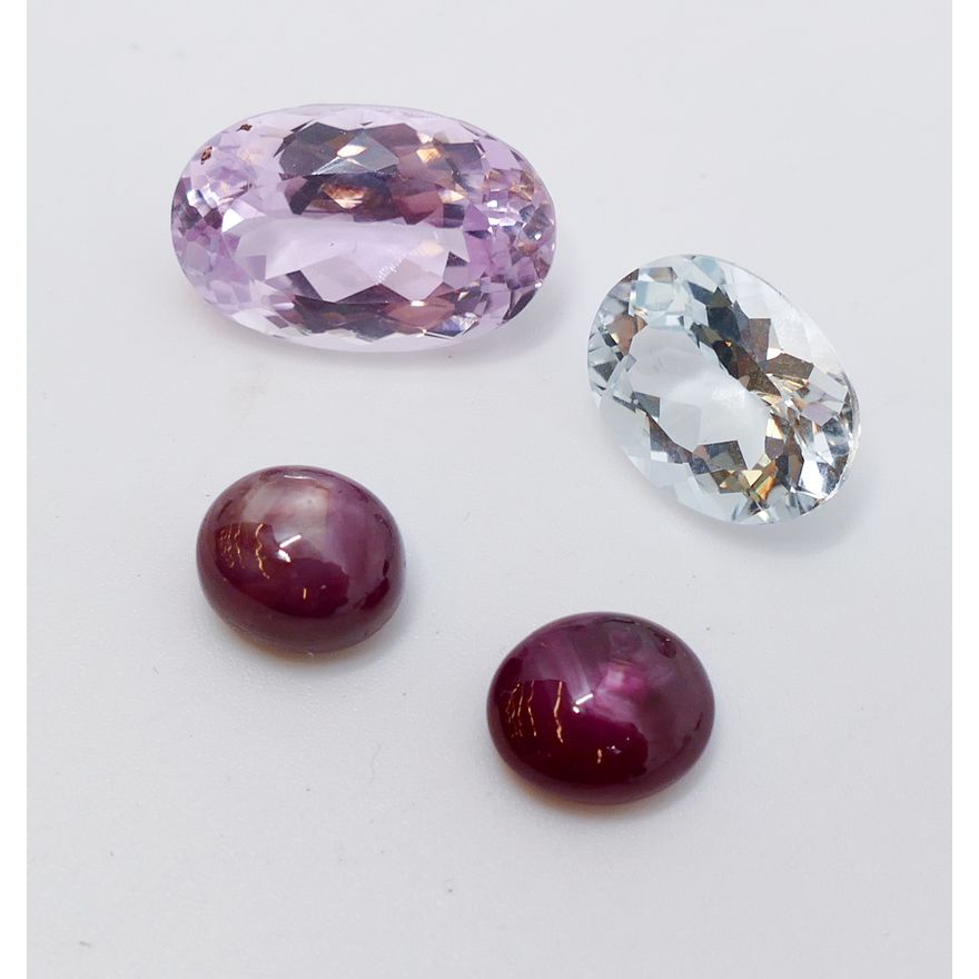 4pc Gem Stones. Includes 2pc Star Ruby Cabochons