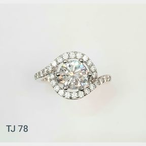 STERLING SILVER RING WITH CUBICS UNITY DESIGN