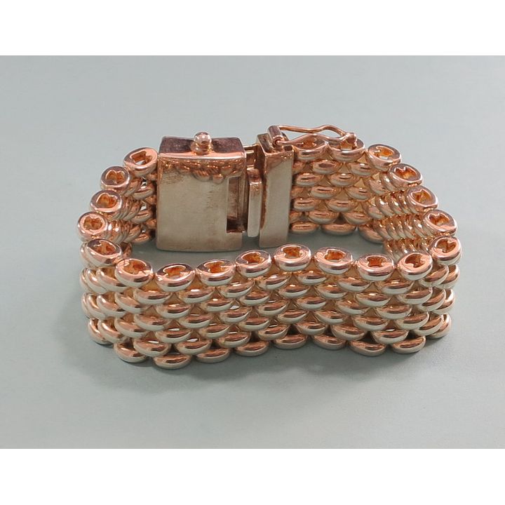A HEAVY QUADRAT STERLING SILVER FLAT-LINK BRACELET.