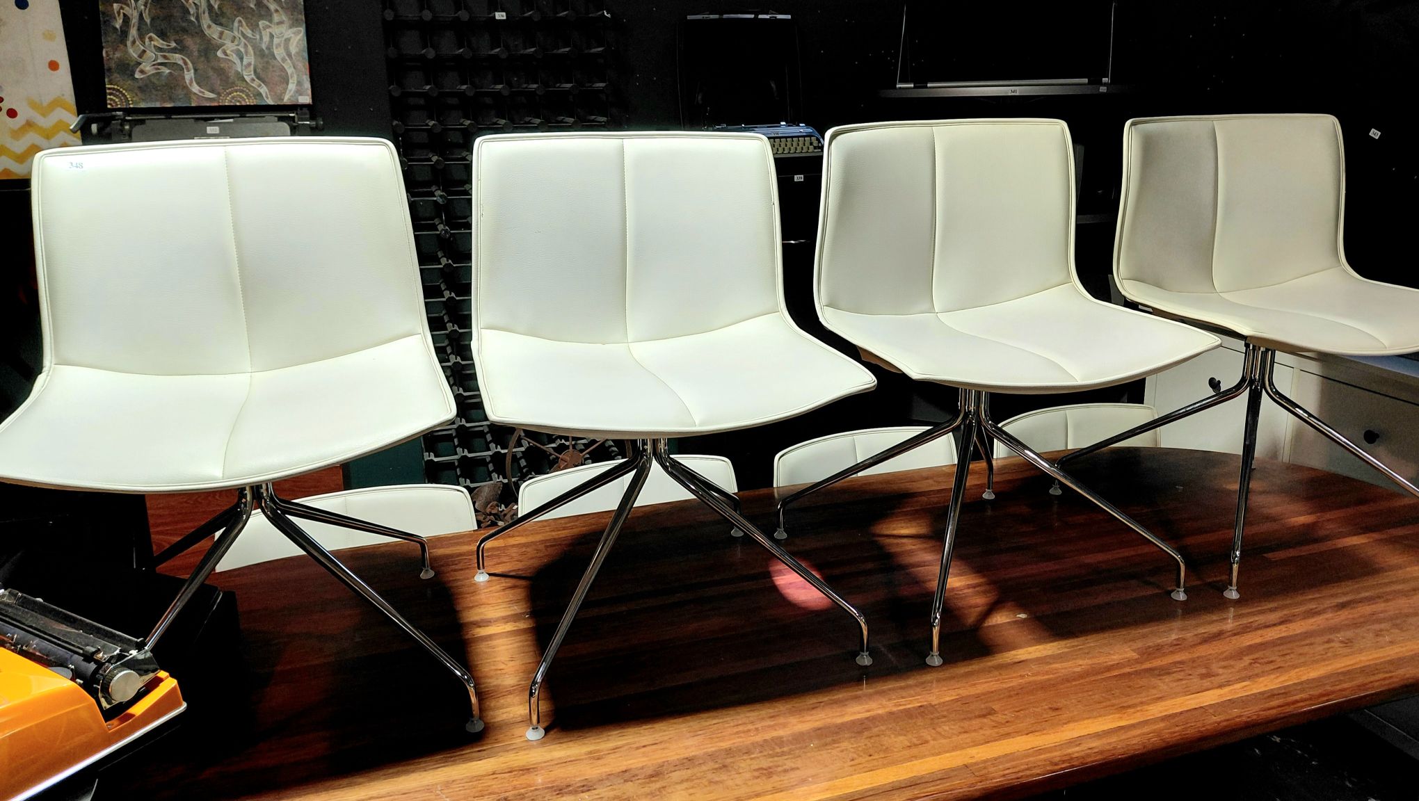 348 · SUITE OF 8 LEATHER CHAIRS