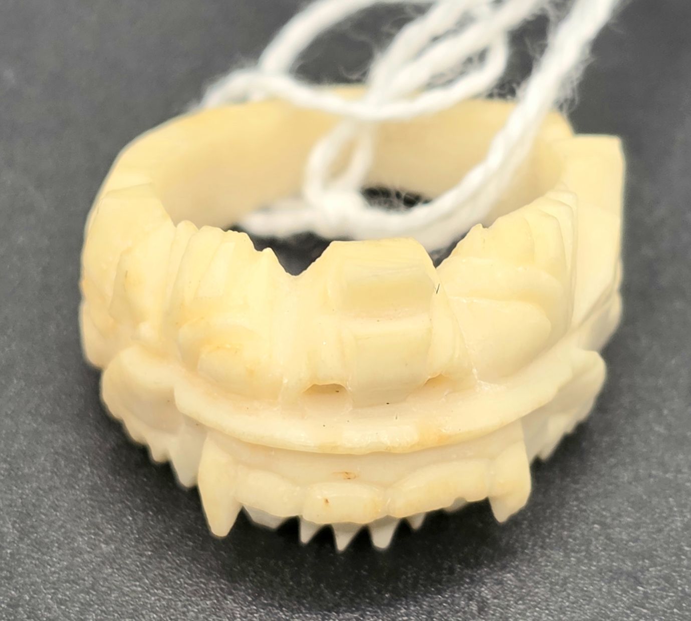 110 · ANTIQUE CARVED IVORY RING