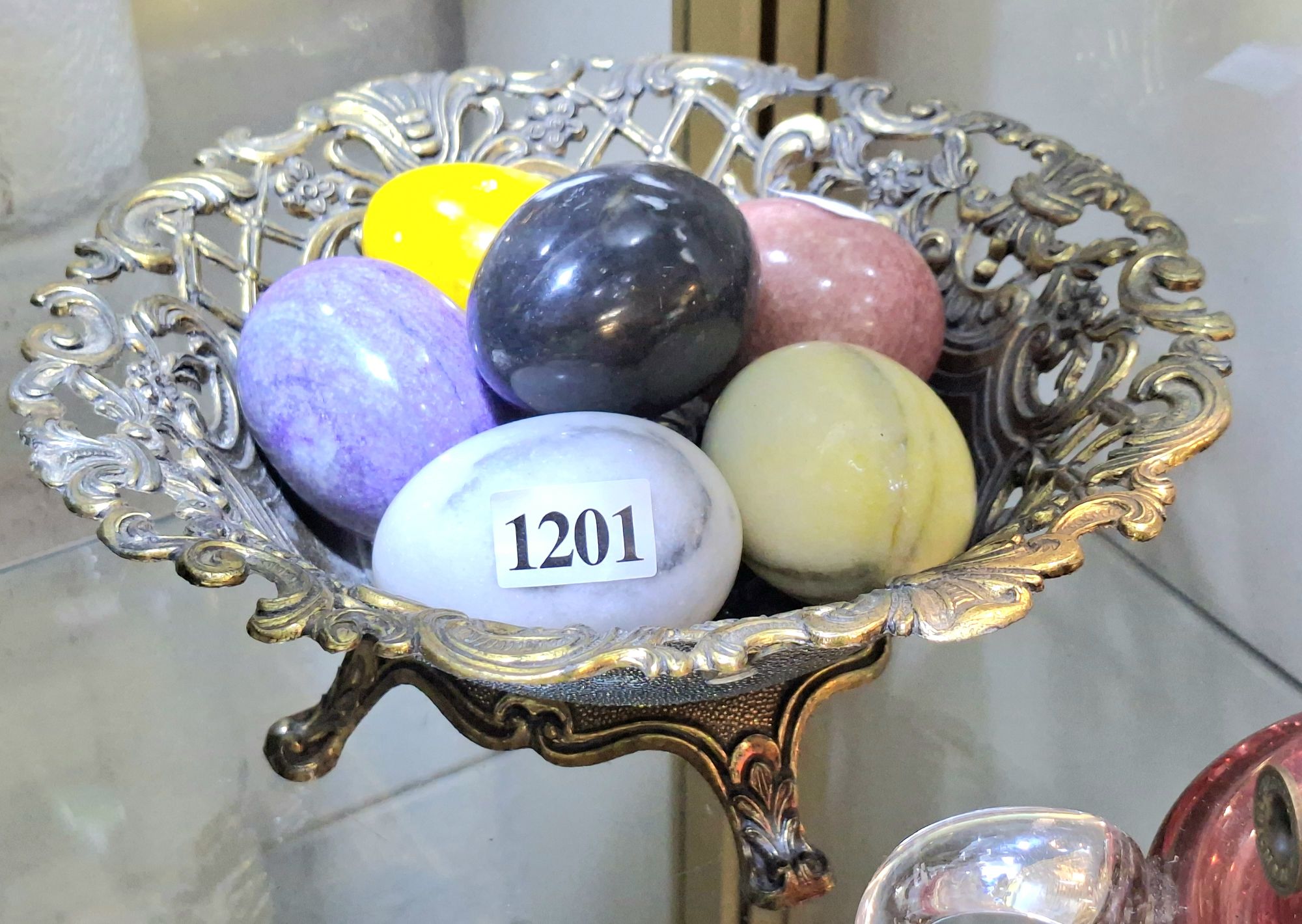 1201 · COLLECTION OF STONE EGGS IN BASKET