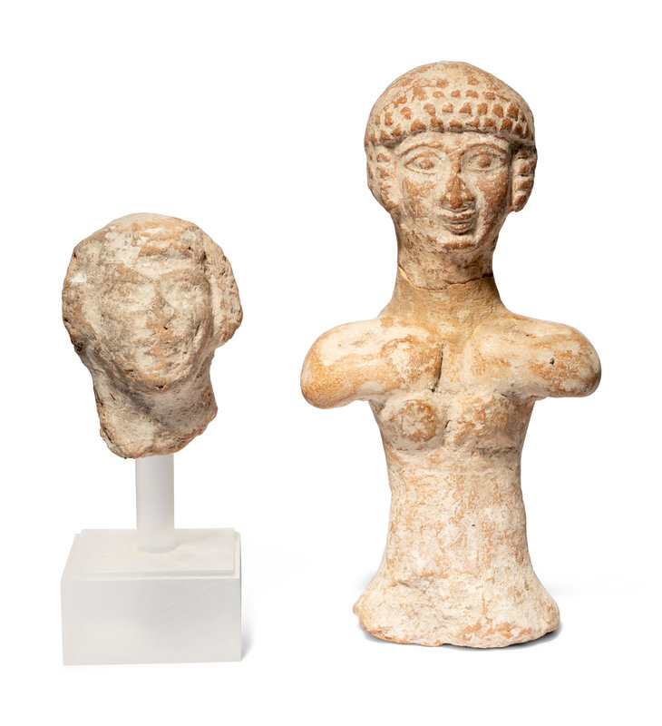 A Near Eastern Terracotta Figure and a Head
Height of tallest 5 7/8 inches (14.9 cm).
