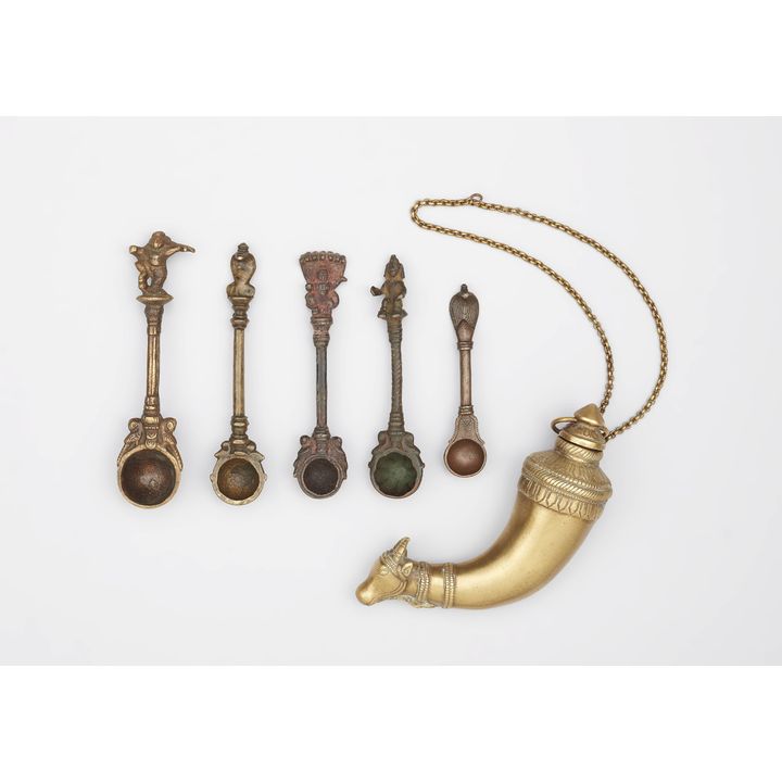 Five Maharashtra copper alloy spoons (shruva or pali) and a holy water sprinkler. 19th century