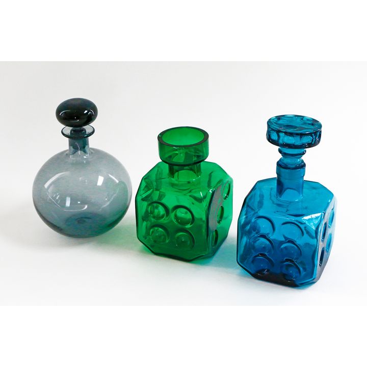 Three vintage Scandinavian glass decanters two with lids