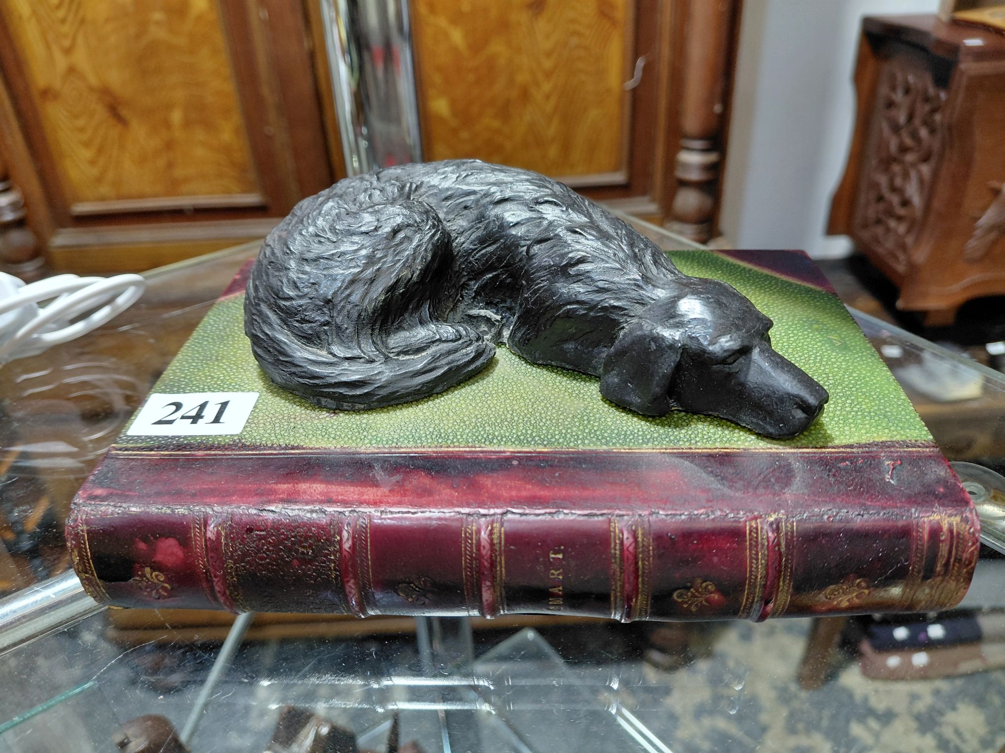 241 · RESTING DOG STATUE