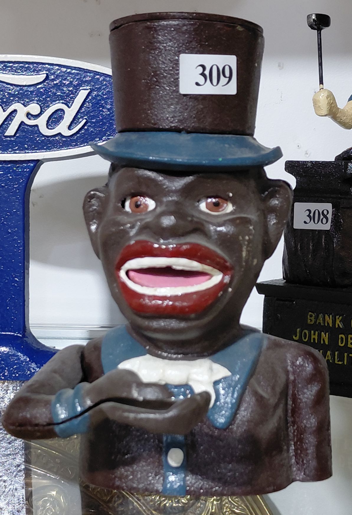 309 · CAST IRON MONEY BOX