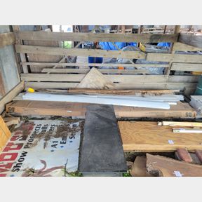 2 Stacks of vinyl siding, drip edge cap and other accessories