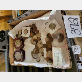 Assortment of Canadian money and 2 Silver Dollars