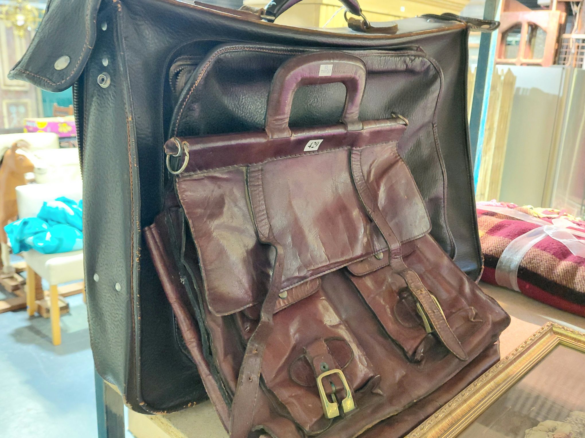 429 · 2 LEATHER LUGGAGE BAGS