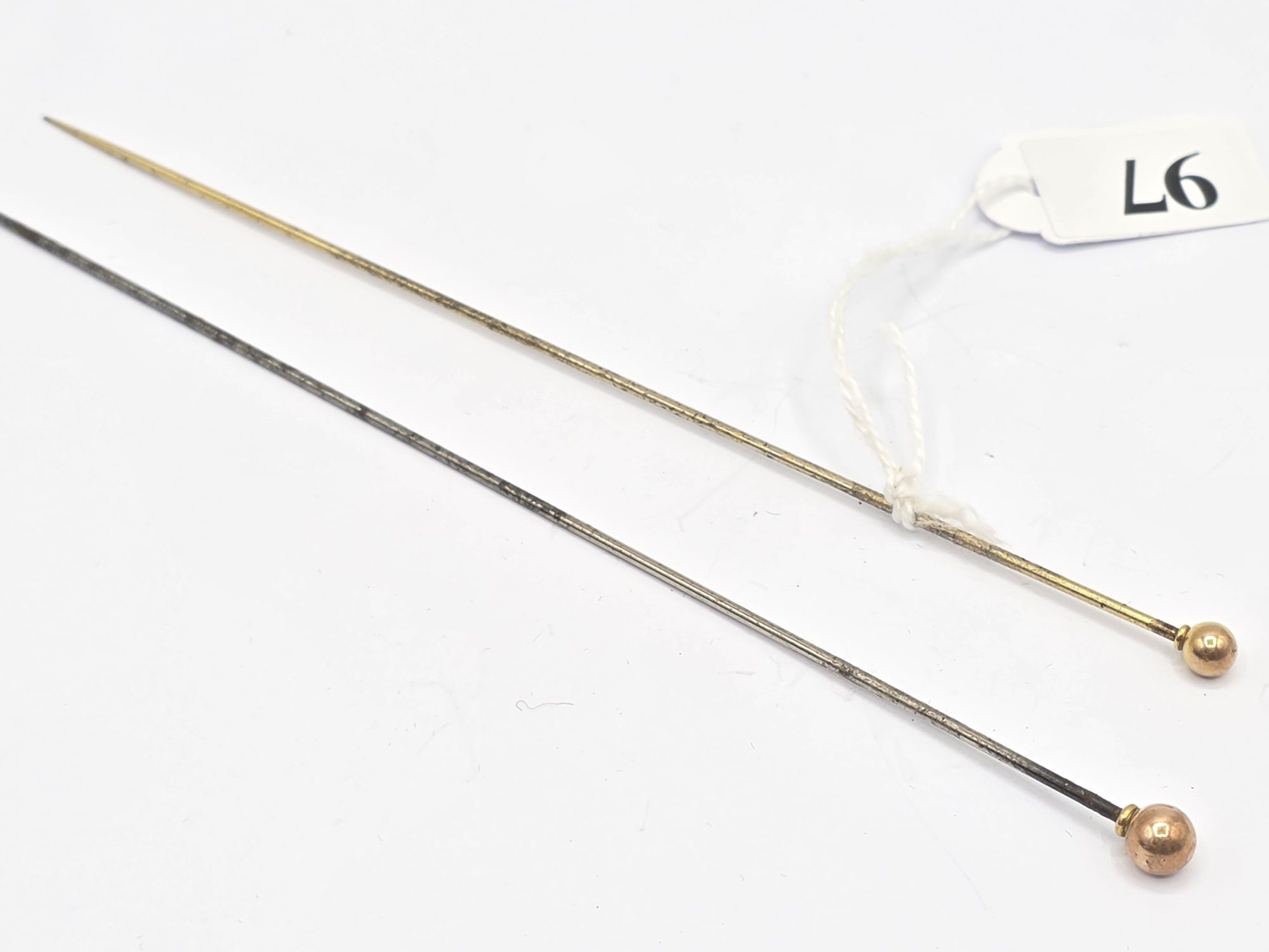 97 · TWO 9CT BALL HAT PINS