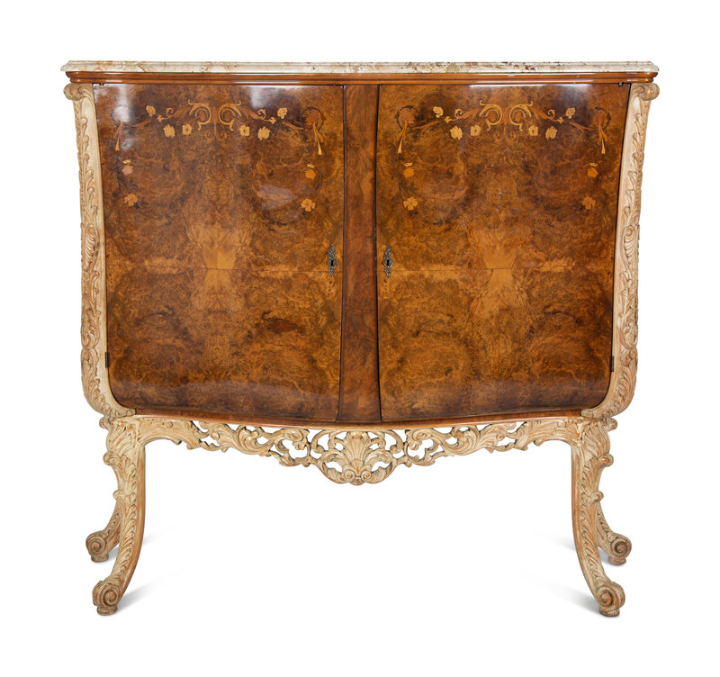 An Italian Burl Walnut and Marquetry Marble-Top Cabinet
Height 58 1/2 x width 62 x depth 24 inches.