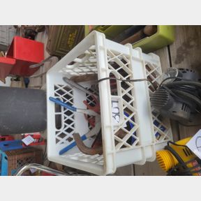 Milk crate of assorted hand tools and allen wrenches