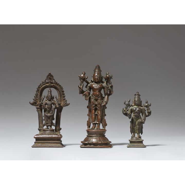 A group of three copper alloy figures of Kartikeya and Vishnu. Southern India. 14th/15th century and later
