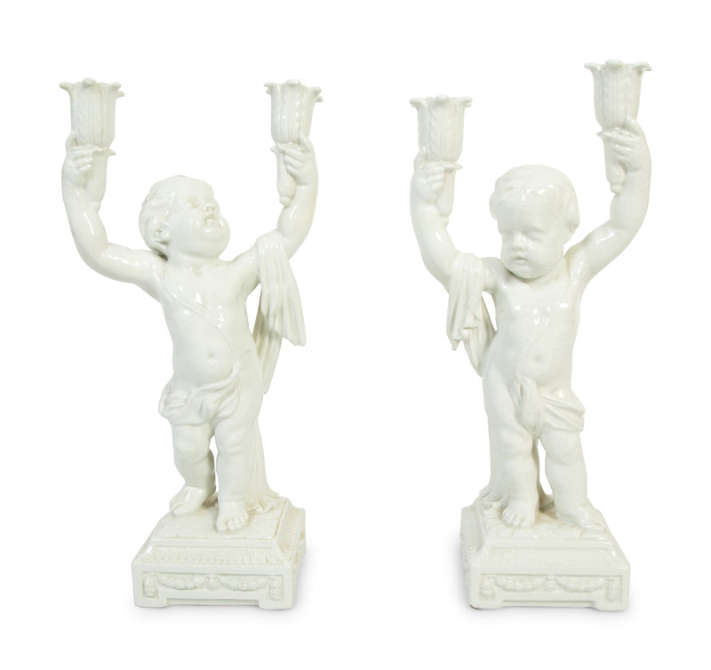 A Pair of Italian Creamware Figural Candelabra
Height 16 1/2 x width 7 1/2 x depth 5 inches. Base: squared 5 inches.