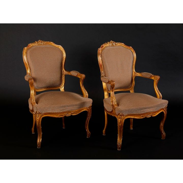 Paire de fauteuils de style Louis XV en bois doré à la feuille. France, XIXème