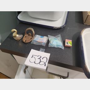 Vintage telephone key chains and other small collectibles