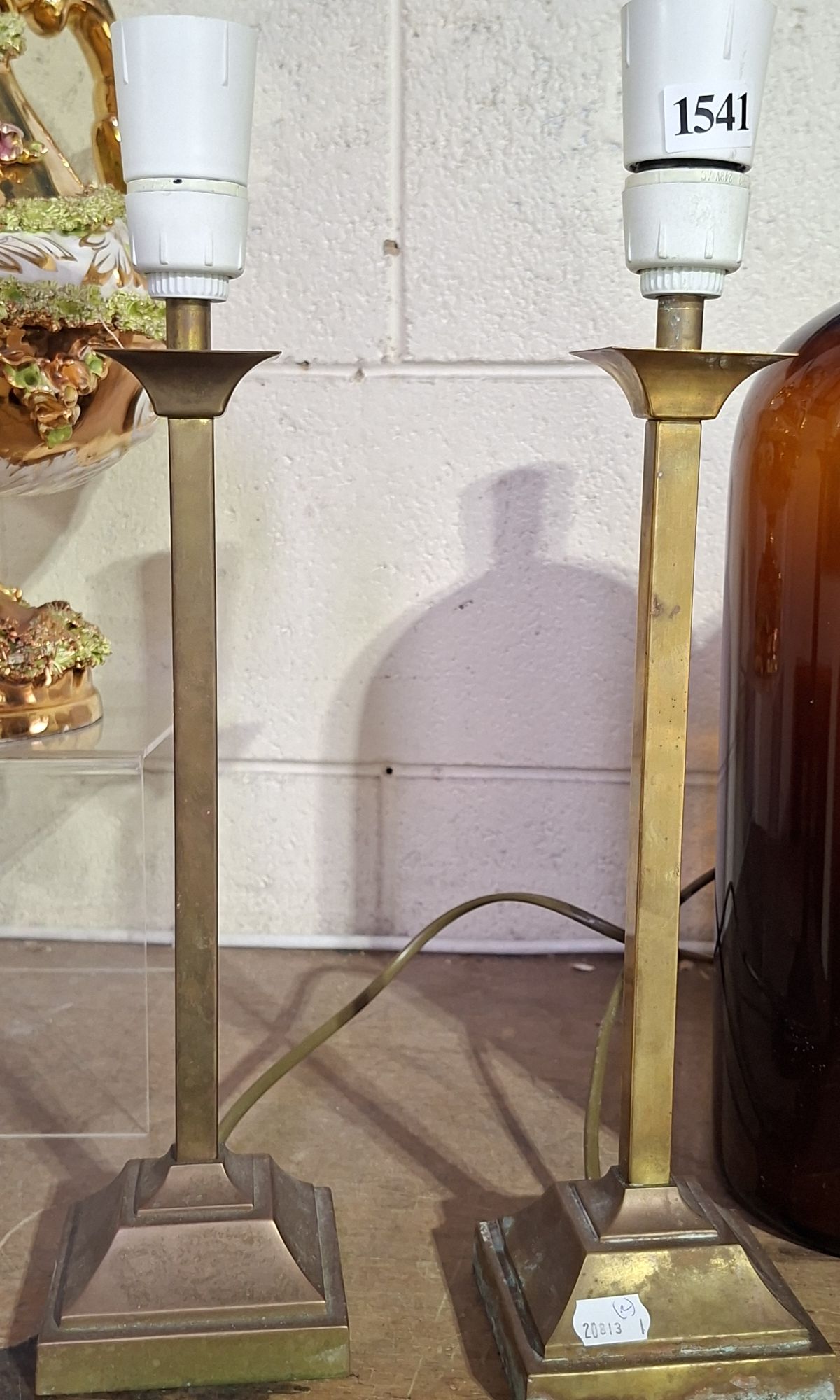 A Pair Of Brass Lamps