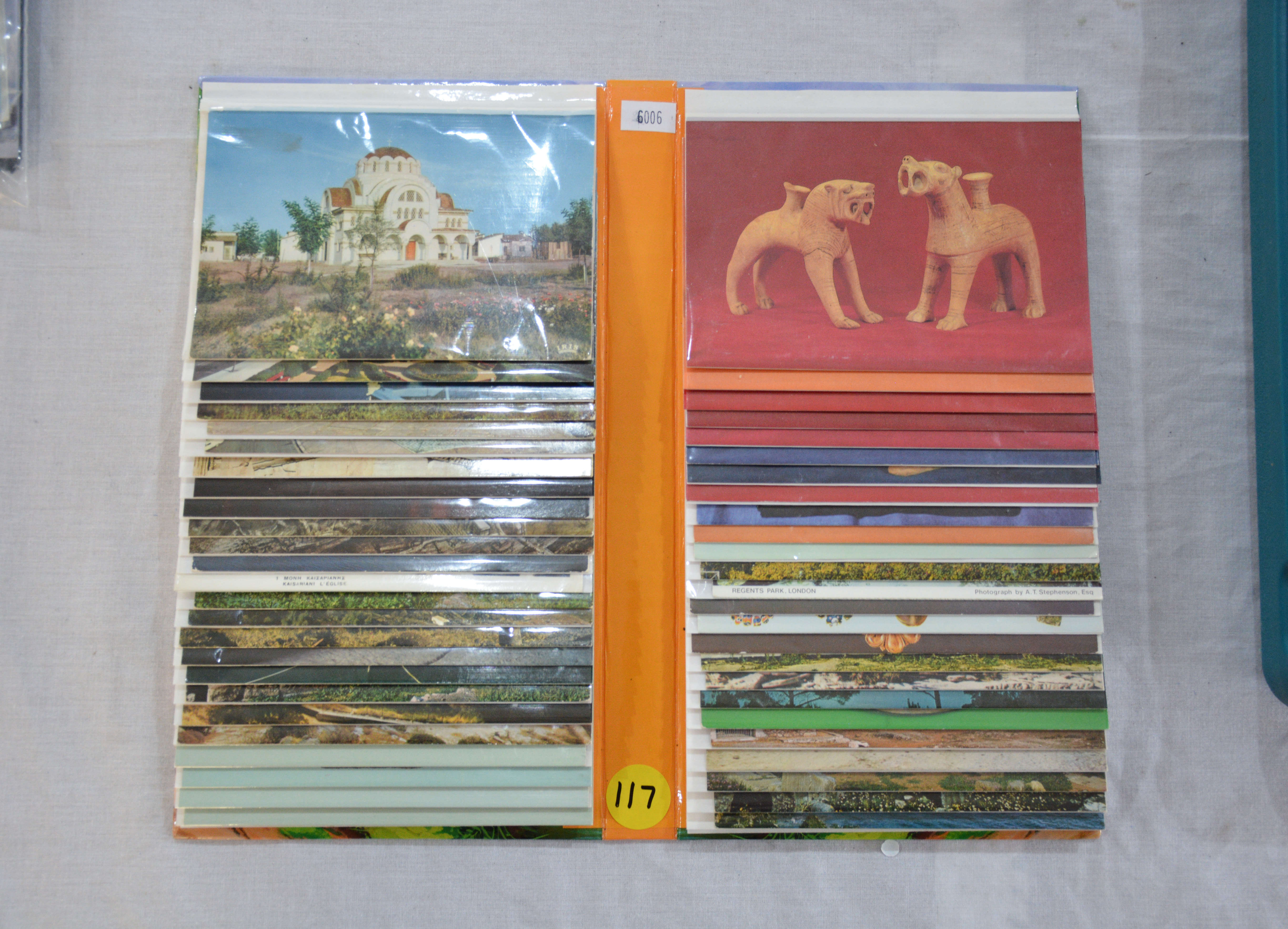 Collection of World Postcards in Album — sold at auction in New Zealand for $15