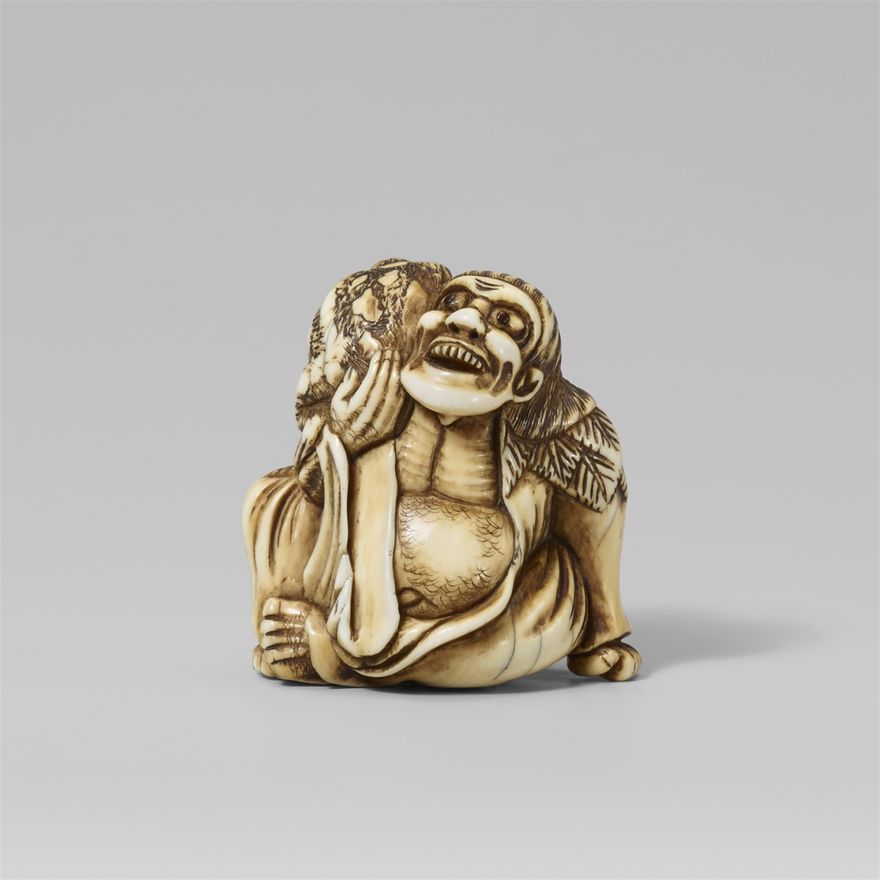 An ivory netsuke of a laughing Gama Sennin with a toad. Late 18th century