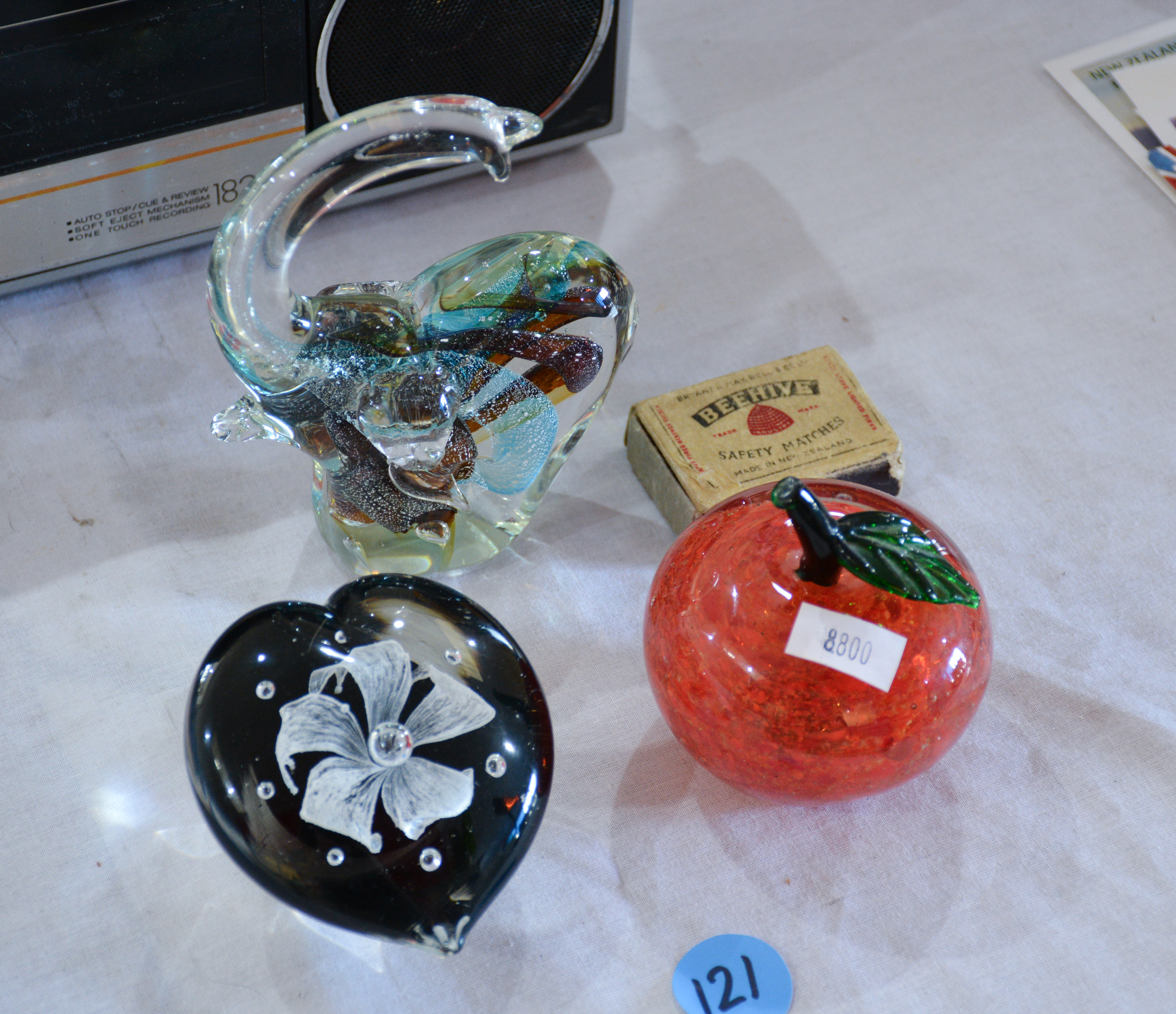 Paperweights x 3 - Apple, Floral Heart, Elephant — sold at auction in New Zealand for $25