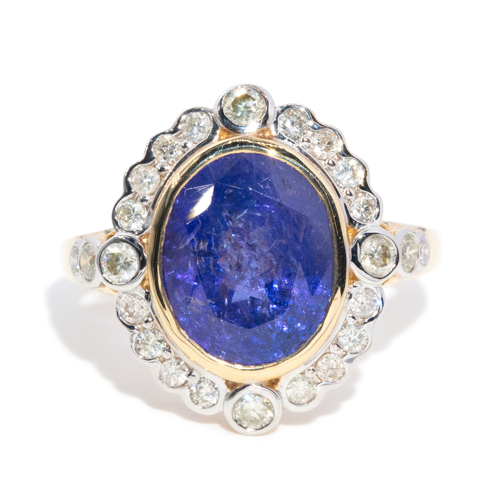 76 · 4.15 Carat Tanzanite & Diamond Halo Ring in 14ct Gold