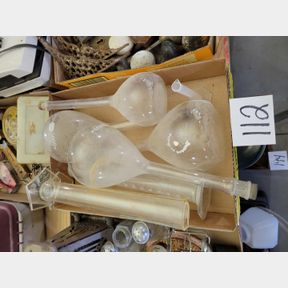 Glass chemistry beakers and graduated cylinders