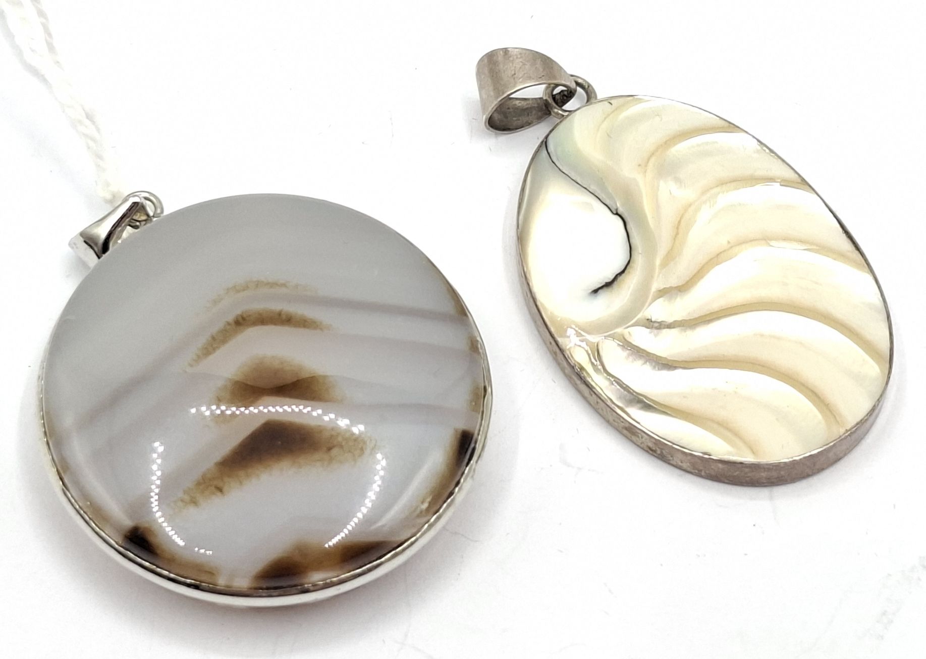 1067 · STERLING SILVER PENDANTS