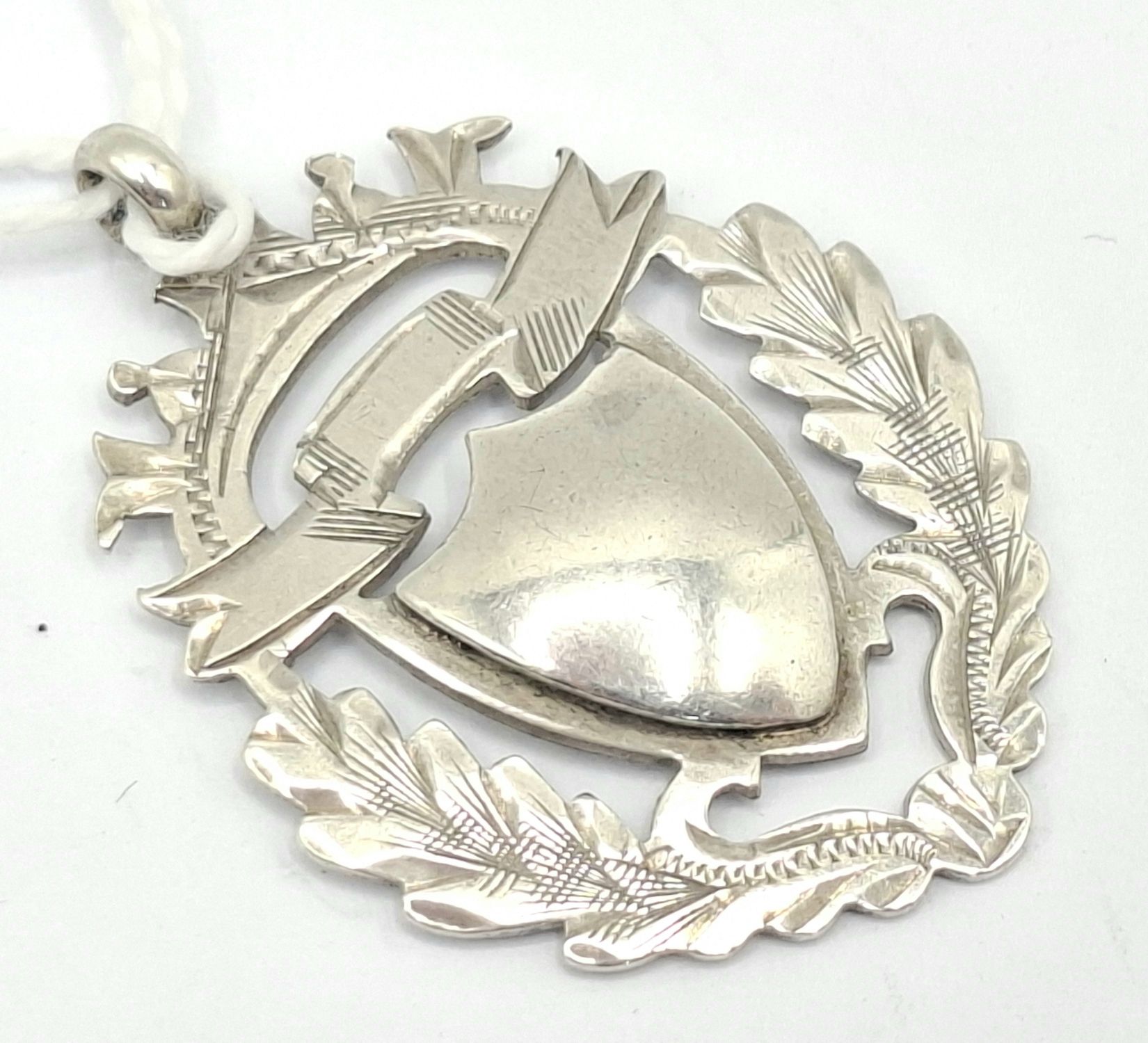 EDWARDIAN STERLING SILVER FOB MEDALLION