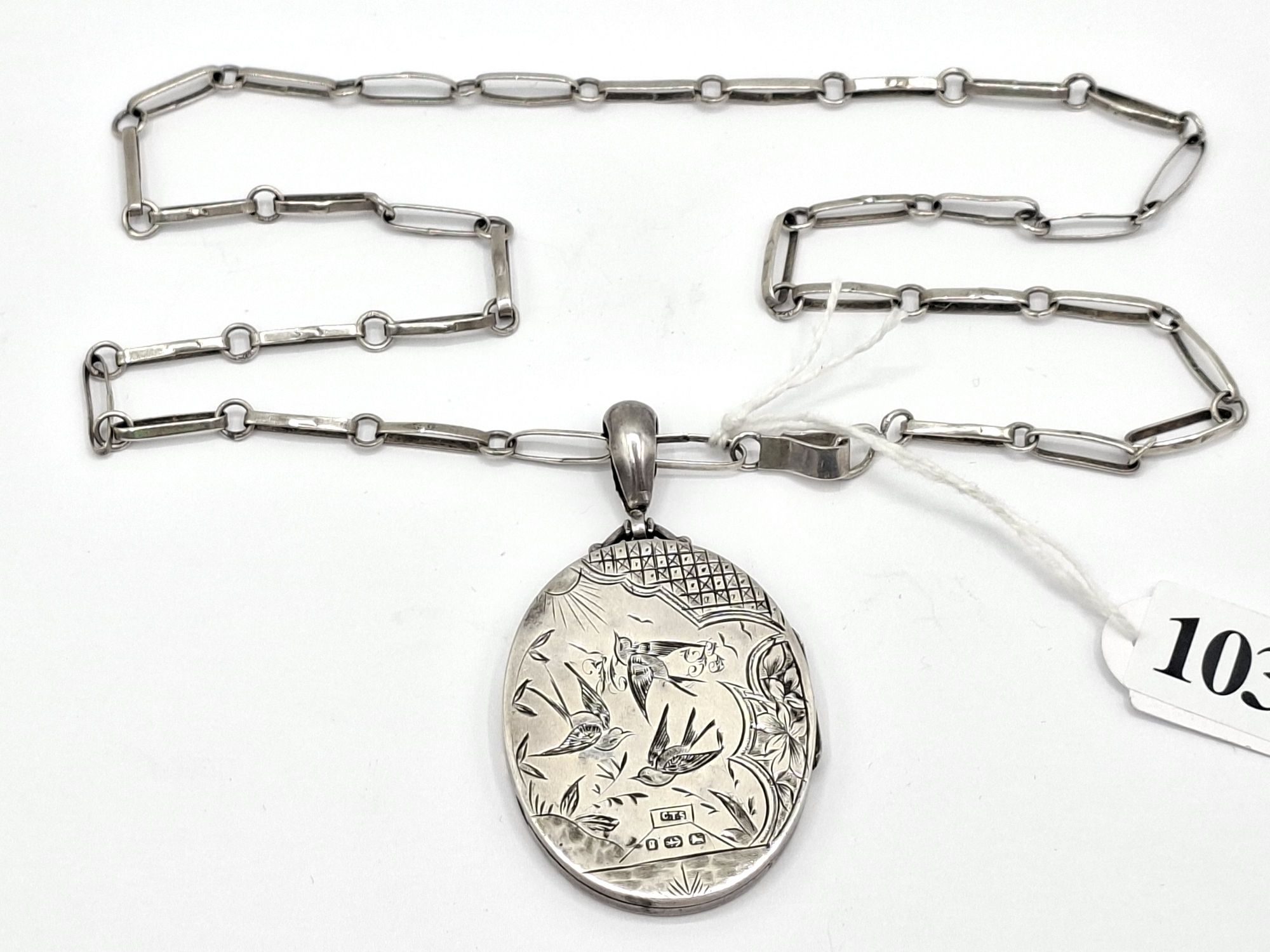 1032 · VICTORIAN STERLING SILVER LOCKET ON CHAIN
