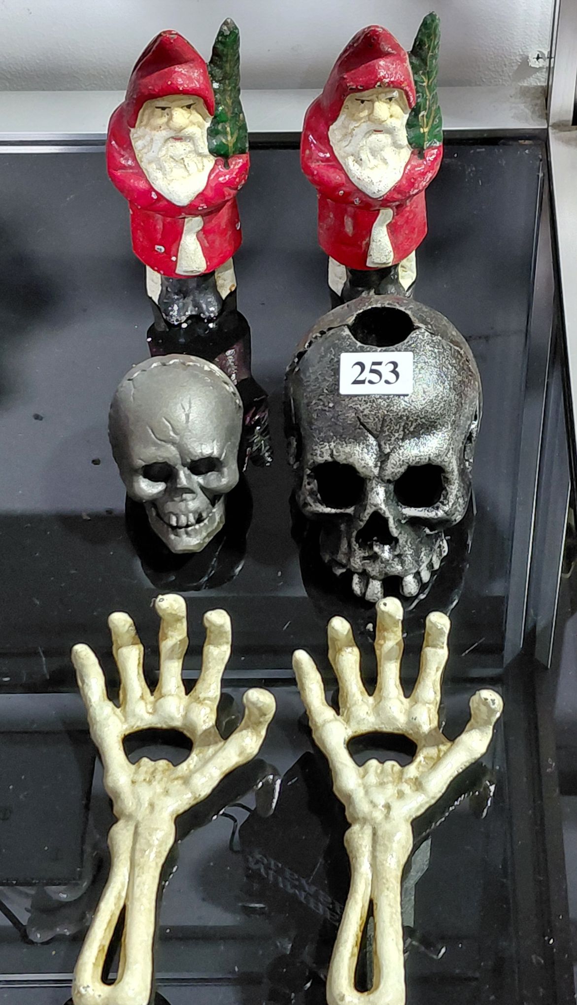253 · CAST IRON SKULLS