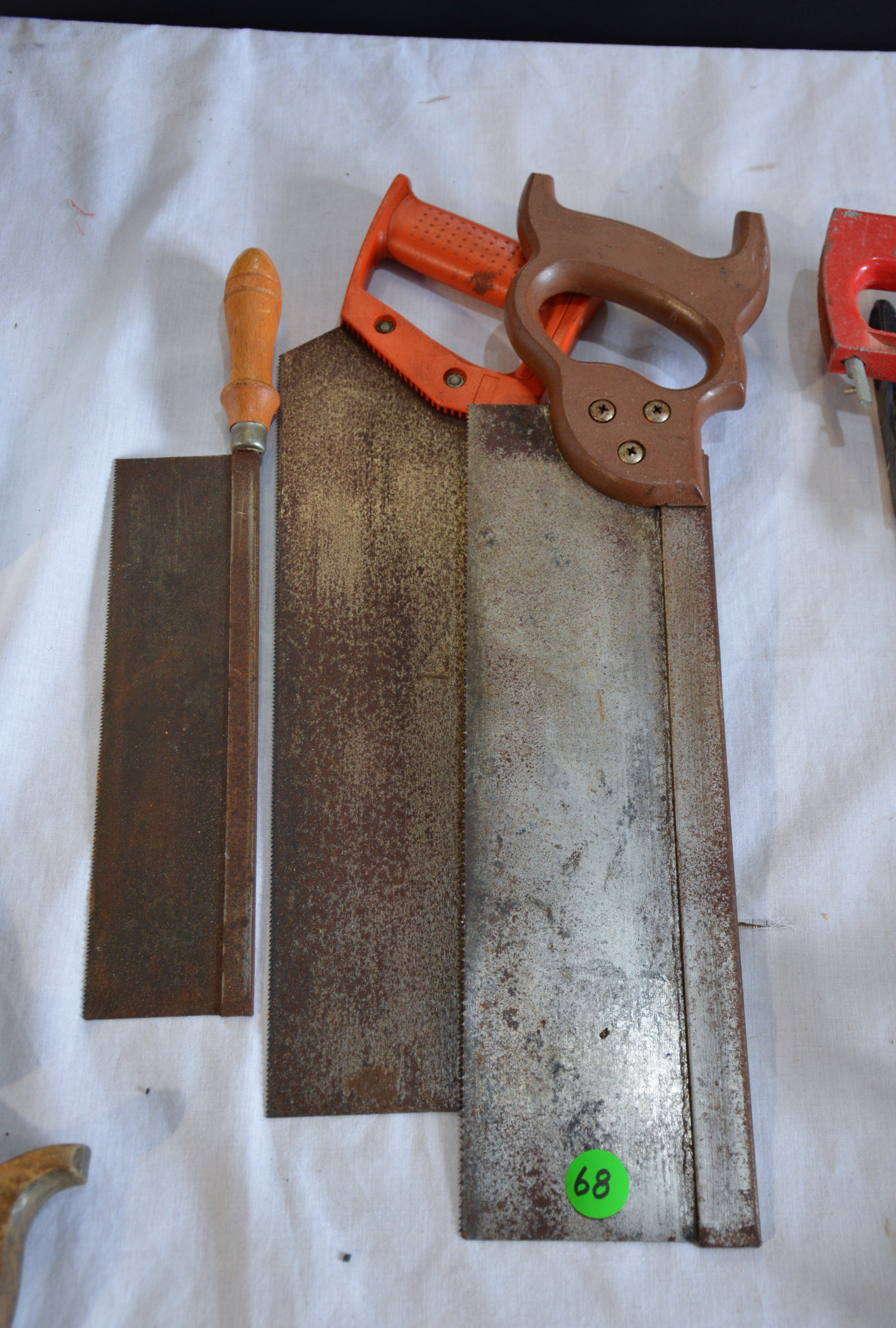 Saws x 3 — sold at auction in New Zealand for $10