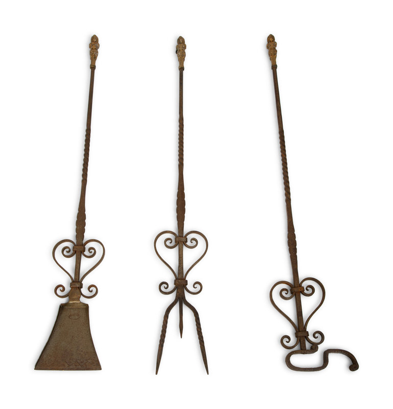 A Set of Three Steel and Brass Fire Tools with Figural Handles
Length 42 inches.
