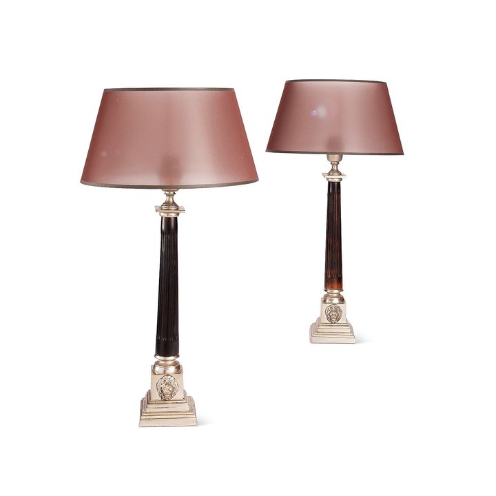 A pair of ebonised and plated brass column table lamps