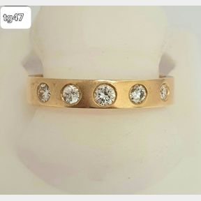 0.50CTOF DIAMONDS SET IN 18CT YELLOW GOLD RING- SIZE W- 5.3GRAMS OF 18CT GOLD