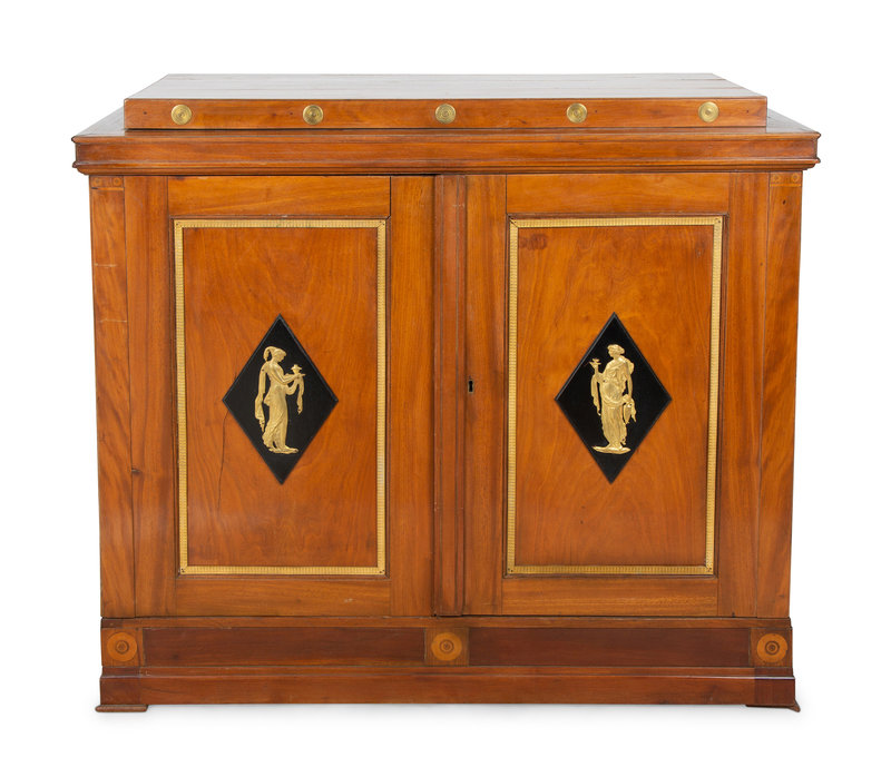 A Continental Neoclassical Mahogany Cabinet
Height 42 1/2 x width 48 1/2 x depth 22 3/4 inches.
