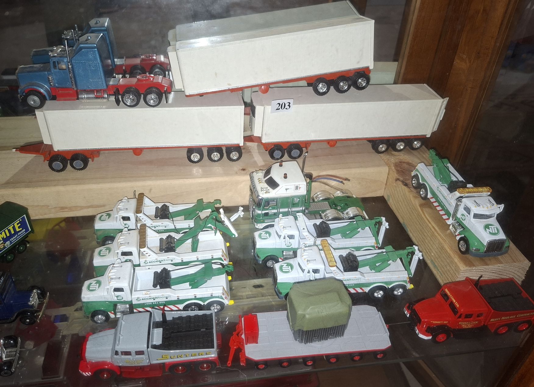 203 · GROUP OF TRUCKS