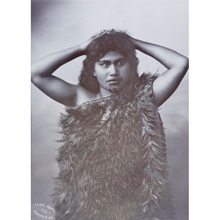 ILES, ARTHUR JAMES [photographer] - Half length portrait of an unidentified young Māori woman
