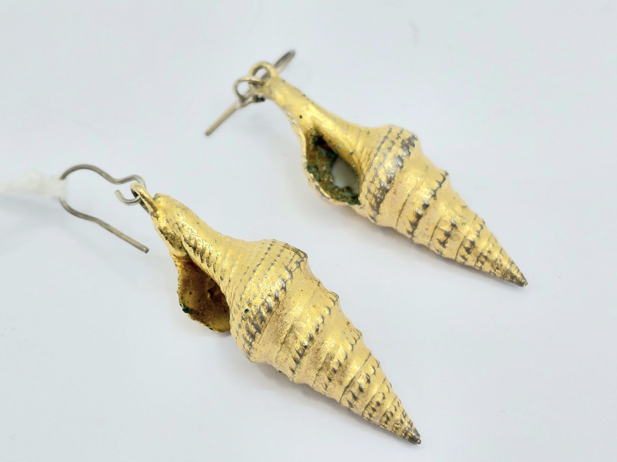 A Pair Of Cornucopia Shell Earrings