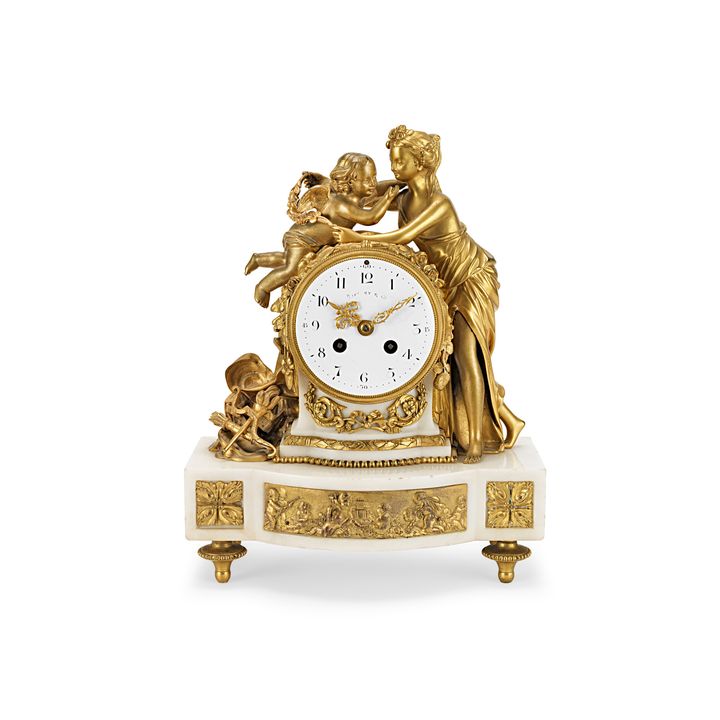 A Louis XVI style white marble mantel clock with gilt bronze mounts, the dial signed Tiffany & Co.