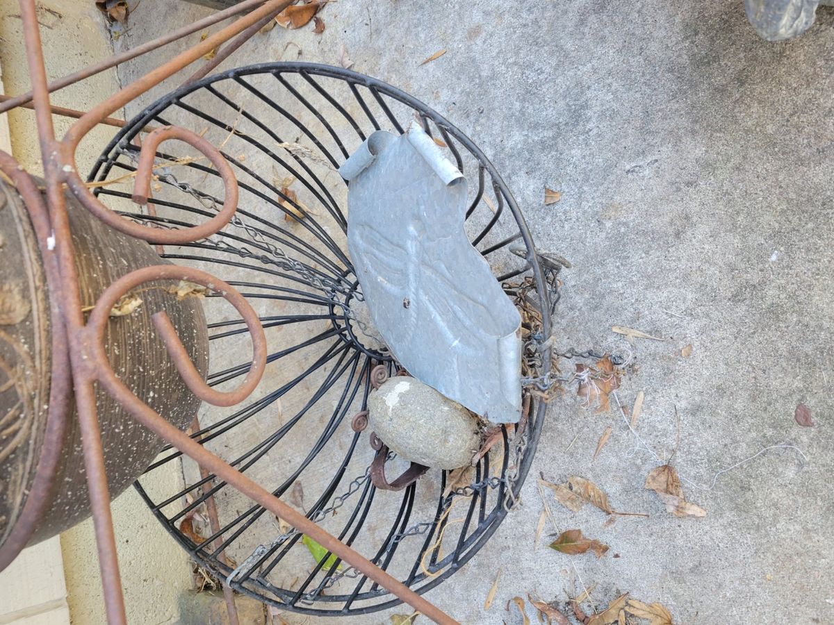 Steel rod chair planter Midwest Auctions, LLC