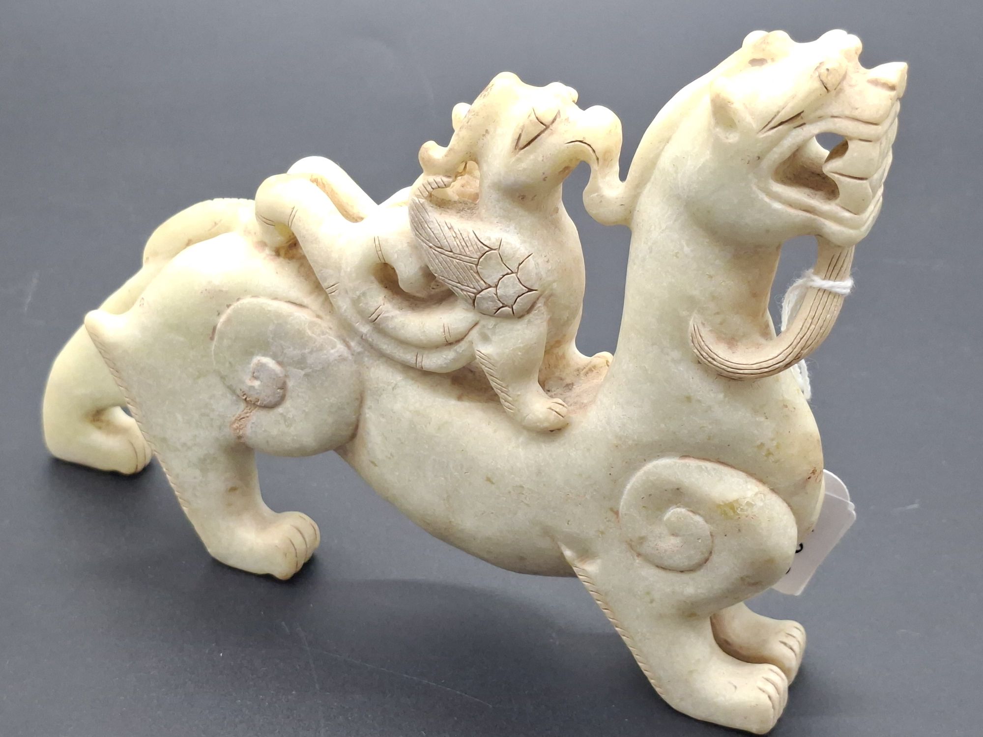 103 · ARCHAIC STYLE CHINESE JADE STATUE