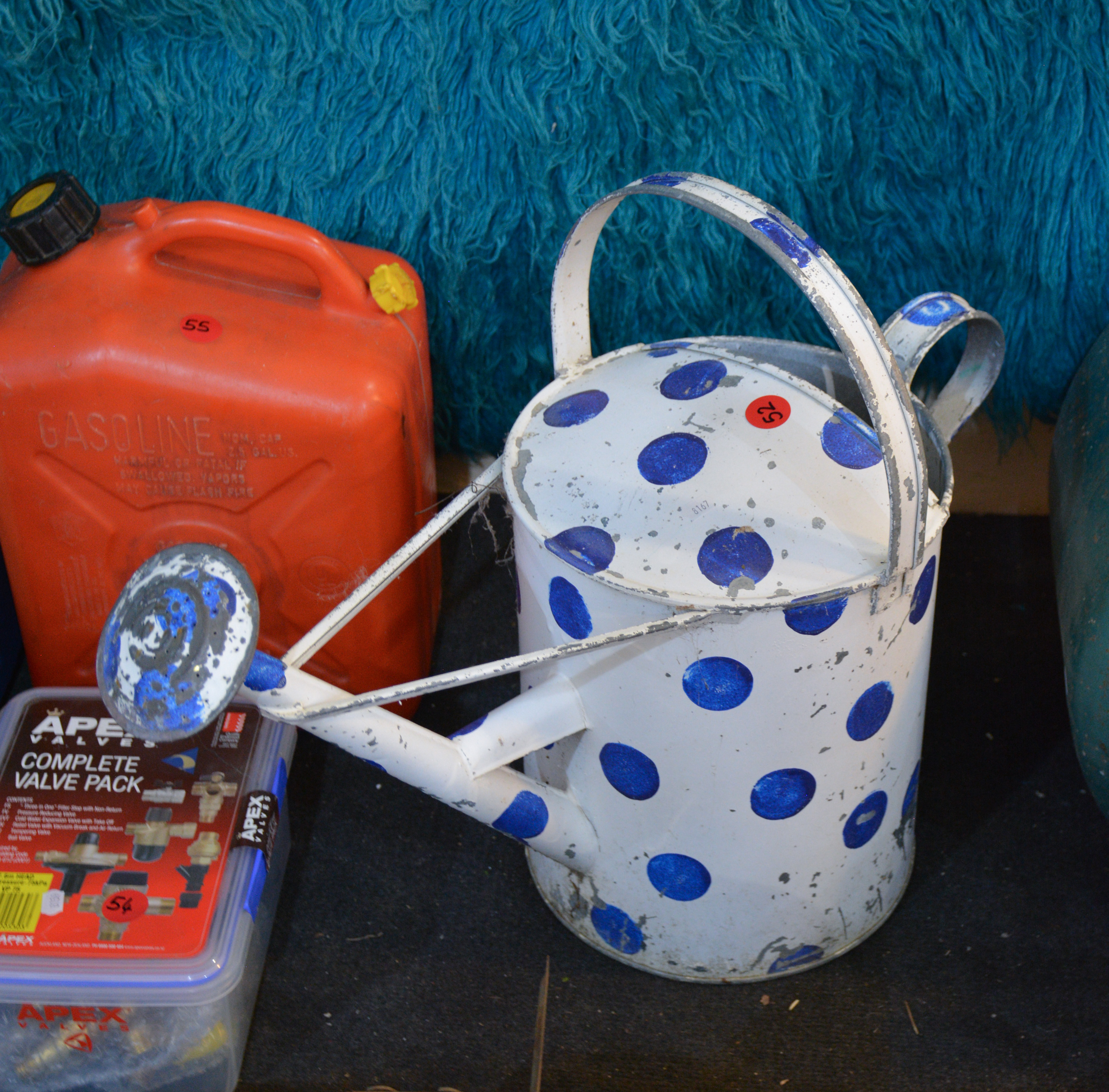 Blue and White Polka Dot Watering Can — sold at auction in New Zealand for $20