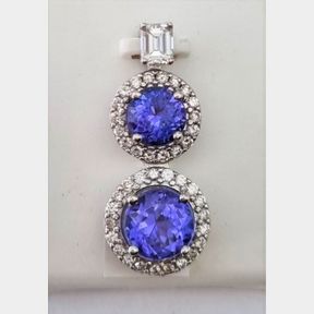 3.613CTS TANZANITE + 0.851CT DIAMONDS INLCUDING 0.351CTS EMERALD CUT DIAMOND 18CT WHITE GOLD PENDANT - 51611/114