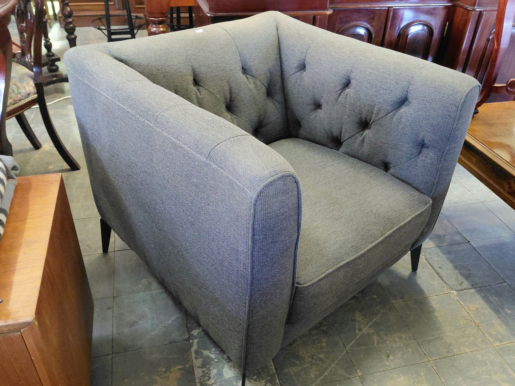 72 · UPHOLSTERED MODERN ARMCHAIR
