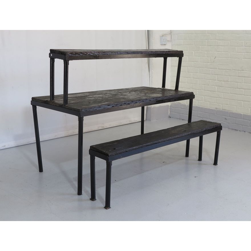 STEEL BASE GARDEN TABLE AND PAIR OF BENCHES