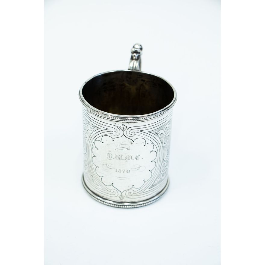 A silver christening mug