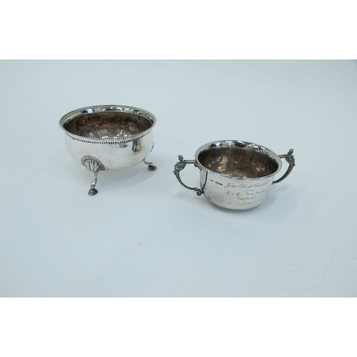 A small sterling silver two-handle bowl